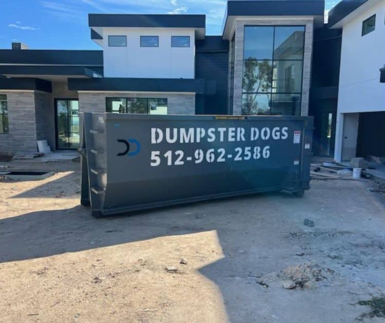Dumpster Rental 30 yard dumpster outside construction project custom home build