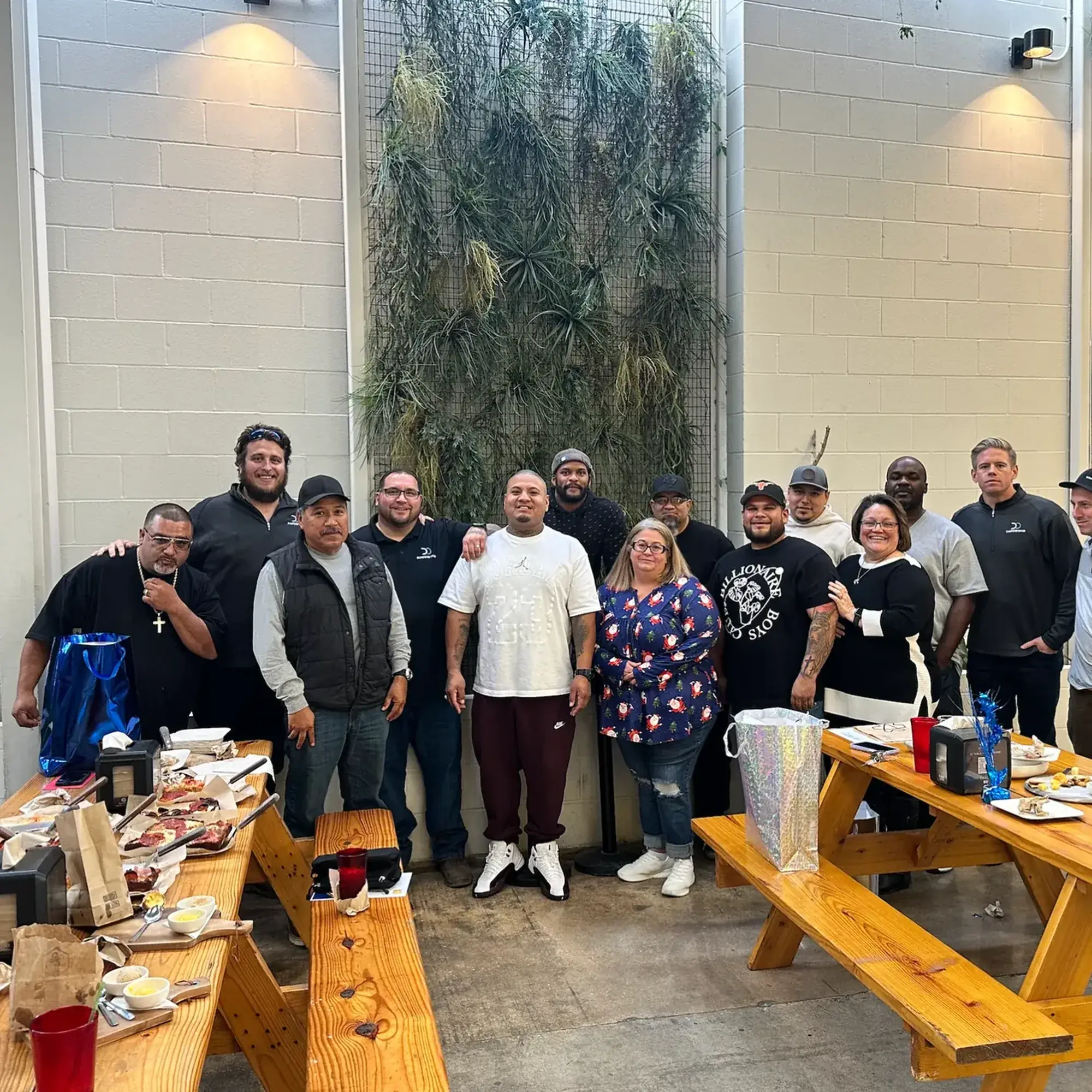 Dumpster Dogs team group photo during a company dinner