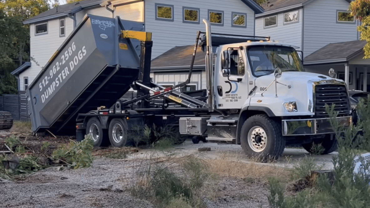 Dumpster Dogs roll-off dumpster delivery truck